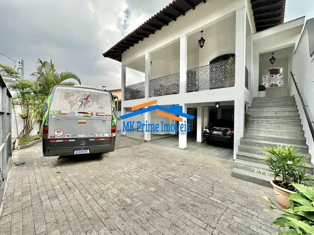 Sobrado à venda com 4 quartos, 432m² - Foto 1