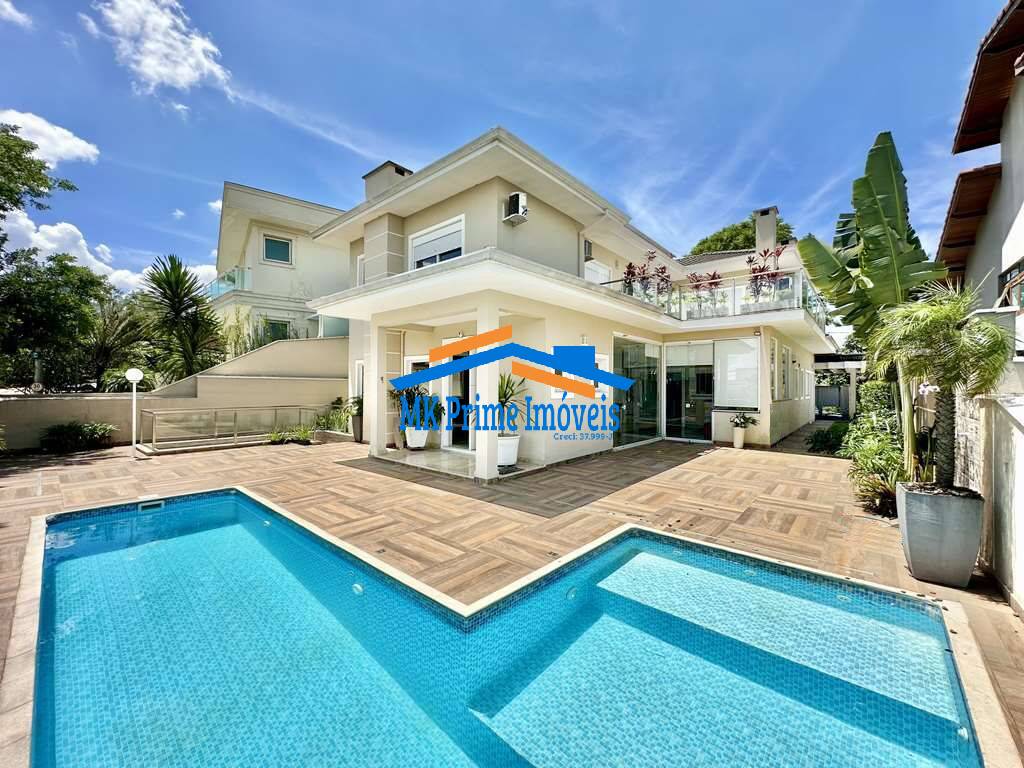Casa de Condomínio para alugar com 4 quartos, 358m² - Foto 1